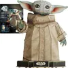 A 3D cardboard model of Grogu from Star Wars, with its packaging in the background. Náhľad obrázku produktu