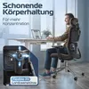 A man is sitting in an ergonomic office chair at a desk with a laptop. Produktbild-Vorschau