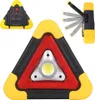 A product shot of a triangular warning light with integrated LED flashlight and solar panel. Voir les images du produit