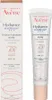 A product shot of a tinted hydrating emulsion and its packaging. Produktbild-Vorschau