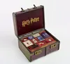 An open trunk filled with Harry Potter themed items. Produktbild-Vorschau