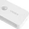A close-up, angled view of a white LED night light with a motion sensor. Produktbild-Vorschau