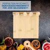 A bamboo cheese board is displayed with various food items and sauces arranged around it, suggesting a culinary or entertaining context. Produktbild-Vorschau