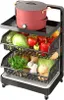 A three-tiered rolling kitchen cart filled with various fresh vegetables and a pot on the top shelf. Produktbild-Vorschau