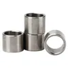 Four metal washers or spacers are arranged on a white background. Podgląd zdjęcia produktu