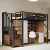 A loft bed with integrated storage and a desk, set up in a room. Náhled obrázku produktu