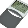 A close-up of a digital alarm clock with a foldable cover. Podgląd zdjęcia produktu