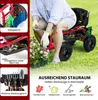 A person is using a red garden cart with a seat and storage compartments on a grassy lawn. Podgląd zdjęcia produktu