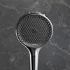 A close-up shot of a modern hand shower head against a dark, marbled background. Anteprima dell’immagine prodotto