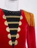 Close-up of a red costume with black and gold detailing, including fringe on the shoulder. Podgląd zdjęcia produktu