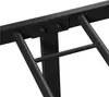 A close-up view of the black metal frame of a bed, showing the connection points with bolts. Podgląd zdjęcia produktu