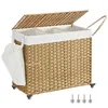 A wicker laundry basket with a lid and three compartments, shown on a white background. Produktbild-Vorschau