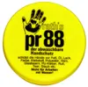 A yellow circular product lid with black text and a handprint graphic. Produktbild-Vorschau