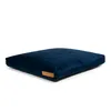 A navy blue dog bed is shown on a white background. Produktbild-Vorschau