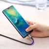 A hand holding a smartphone that is plugged into a USB-C cable. Produktbild-Vorschau