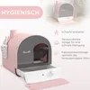 A pink cat litter box with a gray interior and a white pull-out drawer, shown in a room setting with a smaller version of the product in the background. Text overlays describe features. Produktbild-Vorschau
