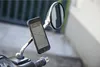 A smartphone mounted on a motorcycle mirror using a SP Connect mount. Náhled obrázku produktu