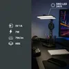 A desk setup with a computer monitor, gaming accessories, and a desk lamp with a fan and clock. Náhľad obrázku produktu