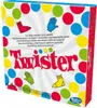 The image shows the front of a Twister board game box, decorated with colorful polka dots and illustrations of game pieces. Náhled obrázku produktu