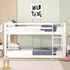 A white wooden bunk bed in a child's bedroom with a framed picture on the wall. Produktbild-Vorschau