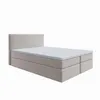 A beige box spring bed with a mattress and topper, shown against a white background. Produktbild-Vorschau