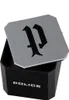 A black hexagonal box with a silver lid featuring a black stylized 'P' logo. The word 'POLICE' is printed on the side of the box. Produktbild-Vorschau