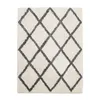 A fluffy rug with a diamond pattern on a white background. Produktbild-Vorschau