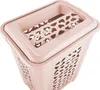 A close-up, top-down view of a pink laundry basket with a lid. Anteprima dell’immagine prodotto