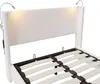 A close-up view of a bed frame with a headboard and integrated reading lights. Náhľad obrázku produktu