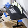 A modern black standing desk setup with multiple monitors and a laptop, shown in a home office environment. Voir les images du produit