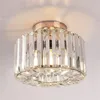 A close-up view of a crystal ceiling light fixture mounted on a white ceiling. Produktbild-Vorschau