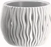 A white planter with a wavy, cut-out design. Podgląd zdjęcia produktu