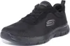 A black Skechers shoe is shown from the side against a white background. Voir les images du produit