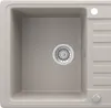 A top-down view of a beige kitchen sink with a silver drain. Anteprima dell’immagine prodotto