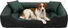 A dog is lying on a dog bed. Voir les images du produit