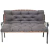 A dark gray tufted bench cushion on a wooden and metal bench. Produktbild-Vorschau