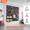 A garage or workshop setting with a tool wall organizer. Náhled obrázku produktu