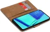 A brown book-style phone case with two cards inserted, showing a smartphone screen. Podgląd zdjęcia produktu