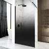 A modern bathroom with a walk-in shower featuring a black gradient glass panel. Anteprima dell’immagine prodotto