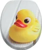 A close-up of a yellow rubber duck on a light wooden surface. Náhled obrázku produktu
