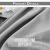 A close-up view of gray fabric with text overlays. Voir les images du produit
