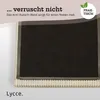 Close-up of the underside of a cushion or mat, showing its texture and anti-slip band. Náhled obrázku produktu