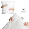 A collage of two images showing a white pillow. The top image shows a person hugging the pillow, and the bottom image shows a close-up of the pillow with a hand holding it. Produktbild-Vorschau