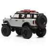 A remote-controlled car, specifically a silver Ford Bronco, is shown from a rear-side angle against a white background. Podgląd zdjęcia produktu
