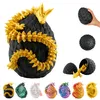 A collage of dragon eggs with dragons inside, in various colors, and a close-up of a black and gold dragon egg. Produktbild-Vorschau