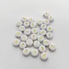 Buchstaben Perlen, 30 Stück, 4x7 mm, gold mit weiß, rund, Produktbild-Vorschau 1