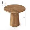 A diagram showing the dimensions of a round wooden table with an octagonal base, with a silhouette of a person for scale. Produktbild-Vorschau