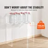 A clear acrylic console table with several large water bottles on top, demonstrating its weight capacity. Náhled obrázku produktu