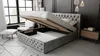 A bedroom scene with a bed frame open to reveal storage space. Náhľad obrázku produktu