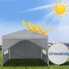 A gray pop-up gazebo is set up on a grassy lawn under a sunny sky. Arrows indicate UV protection. Náhled obrázku produktu